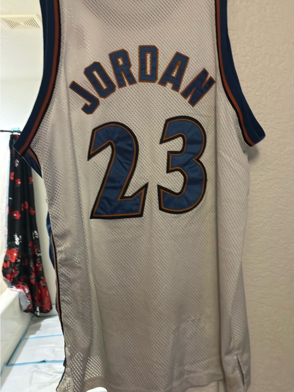 Nike White Basketball Jersey with Blue and Orange Trim